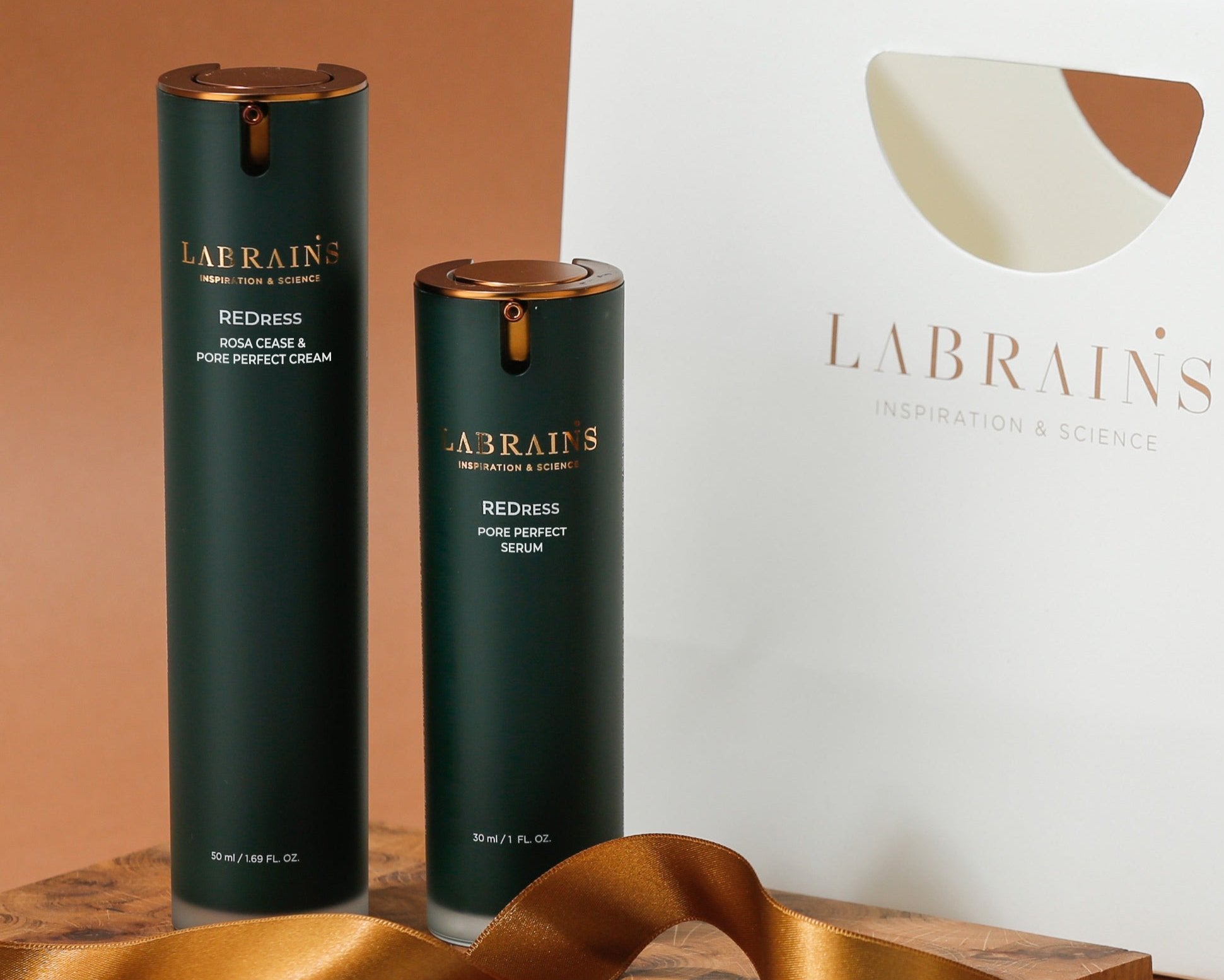 labrains redress skincare products with a golden ribbon and a gift bag