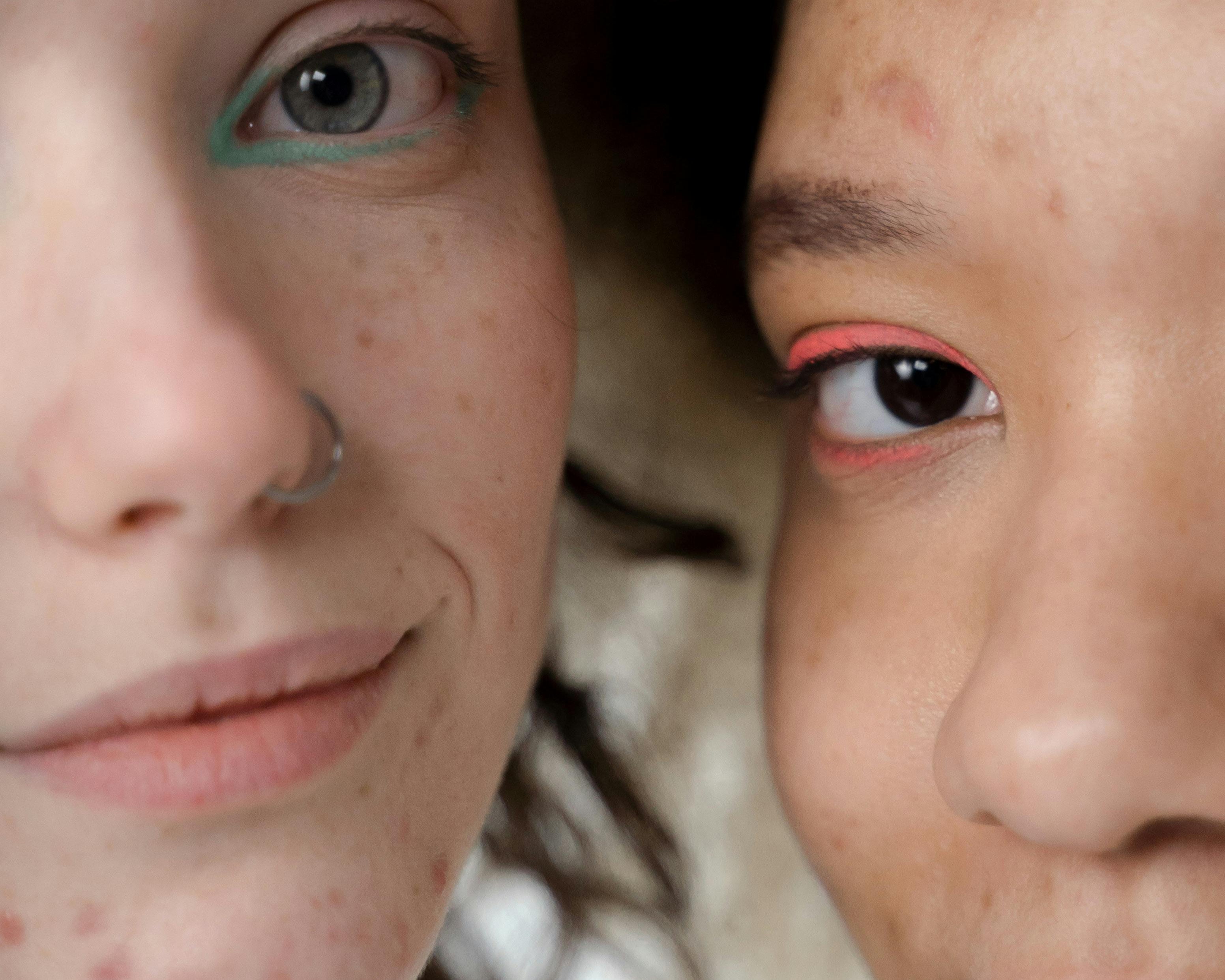 two people with acne and make up