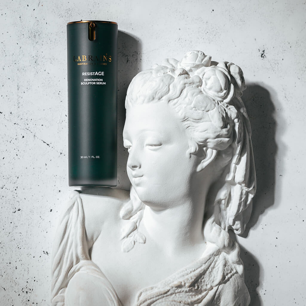 art photo of labrains renovation sculptor serum on a shoulder of a statue