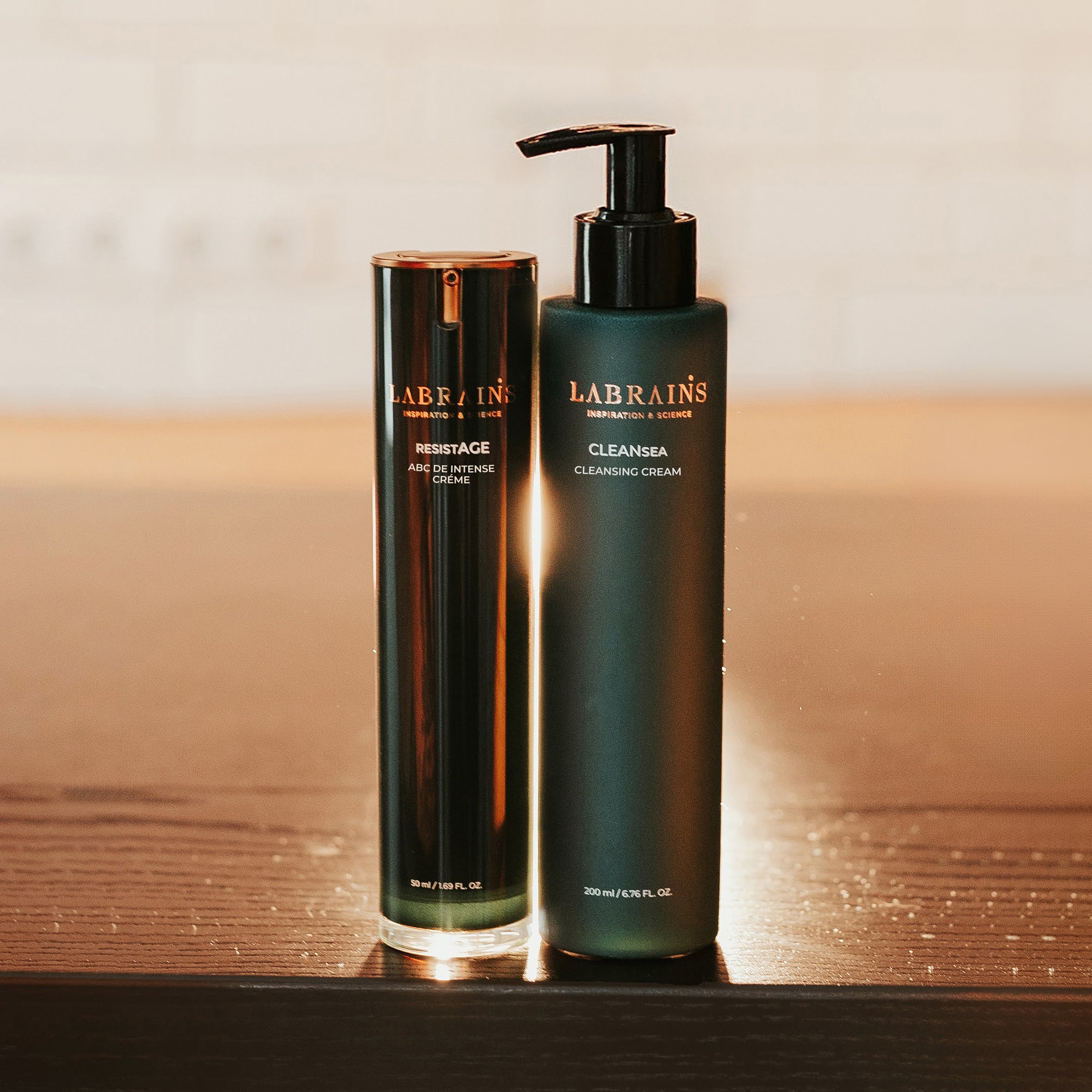 Two LABRAINS skincare products on a wooden surface with a neutral background