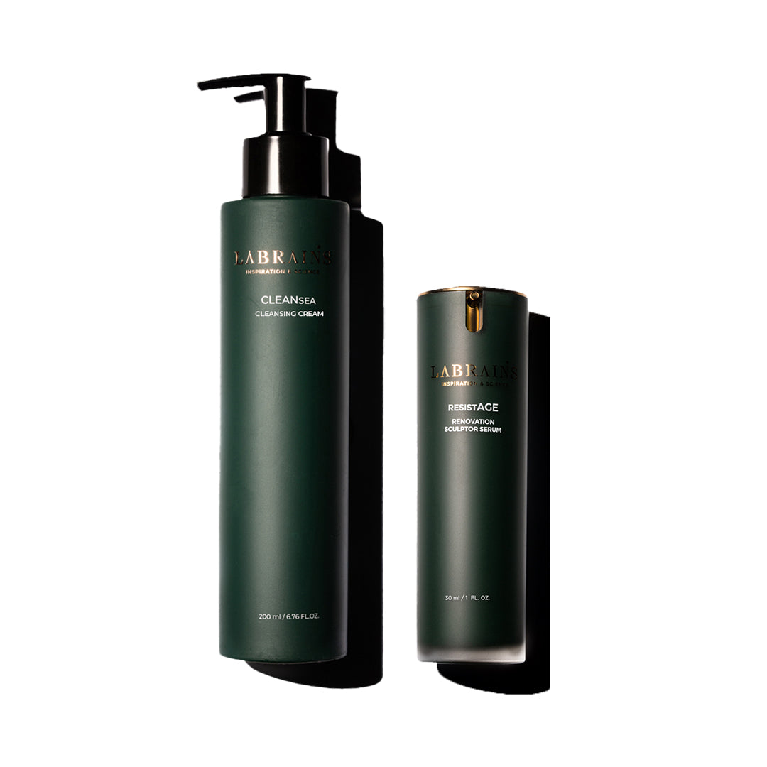 Two dark green LABRAINS skincare bottles, labeled Cleansing cream and Renovation Sculptor serum, on a white background