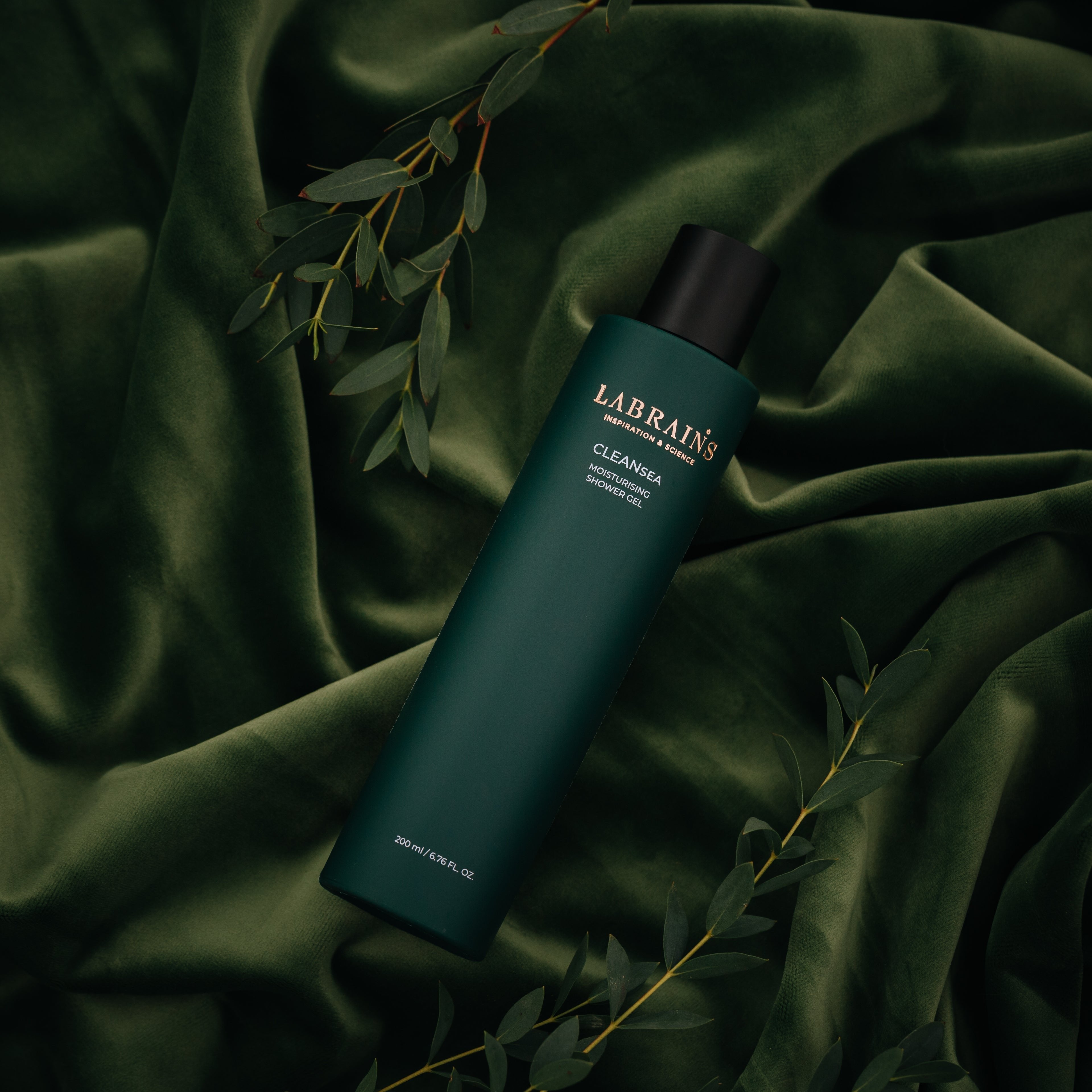labrains shower gel bottle on green fabric background