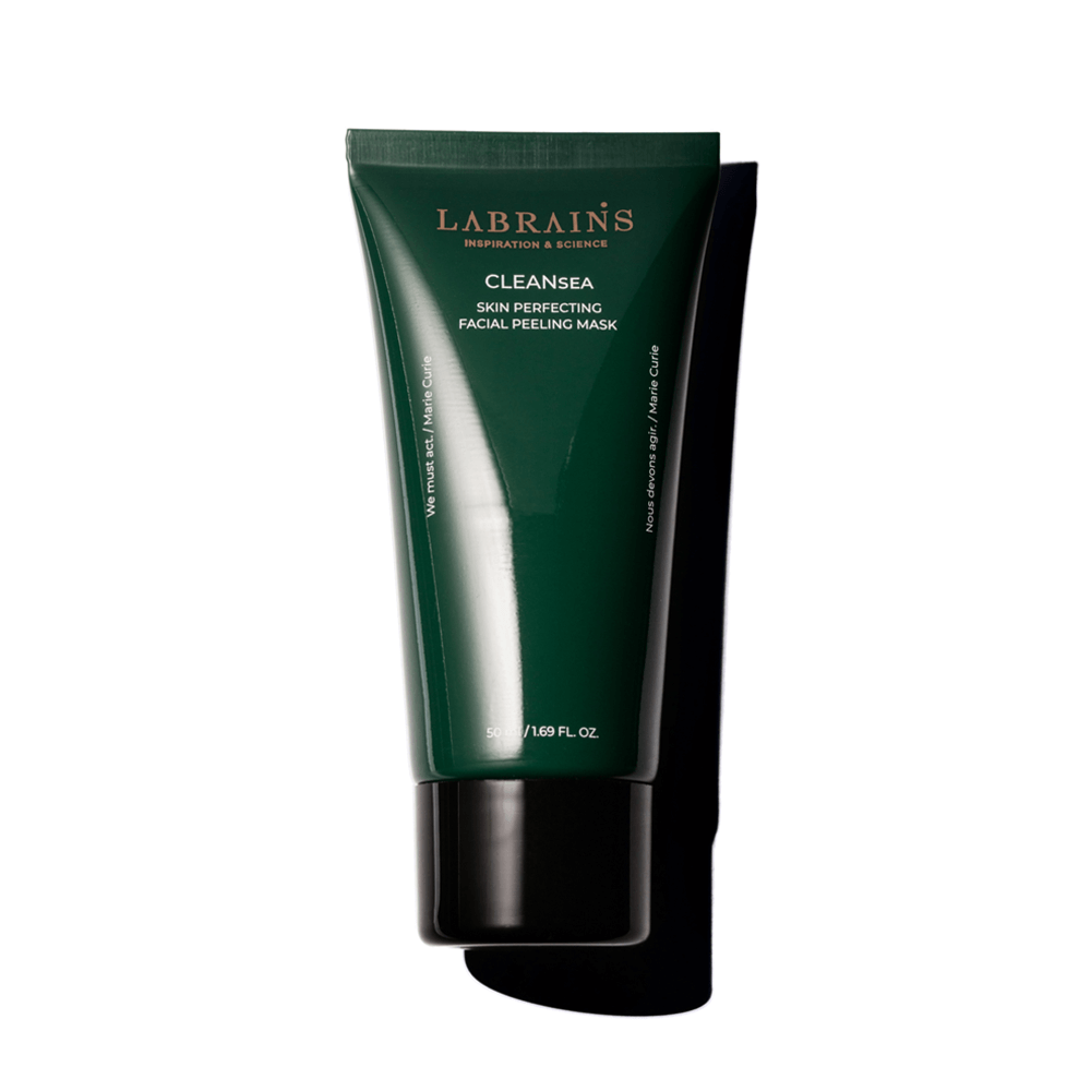 A green tube of LABRAINS skin-enhancing face peeling mask on white background.